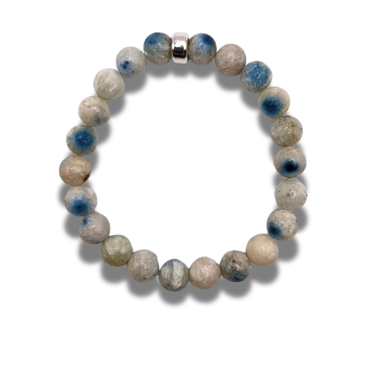A Blue Ice Glacierite 8mm beaded bracelet with sterling silver accent bead.