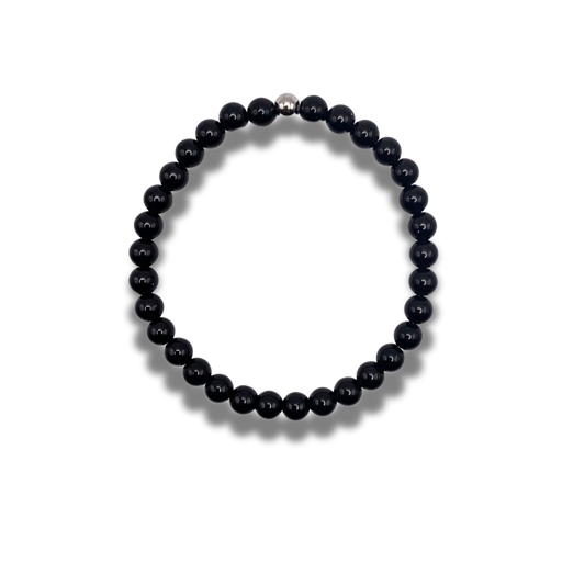 A black obsidian 6mm beaded bracelet with stainless steel accent bead.